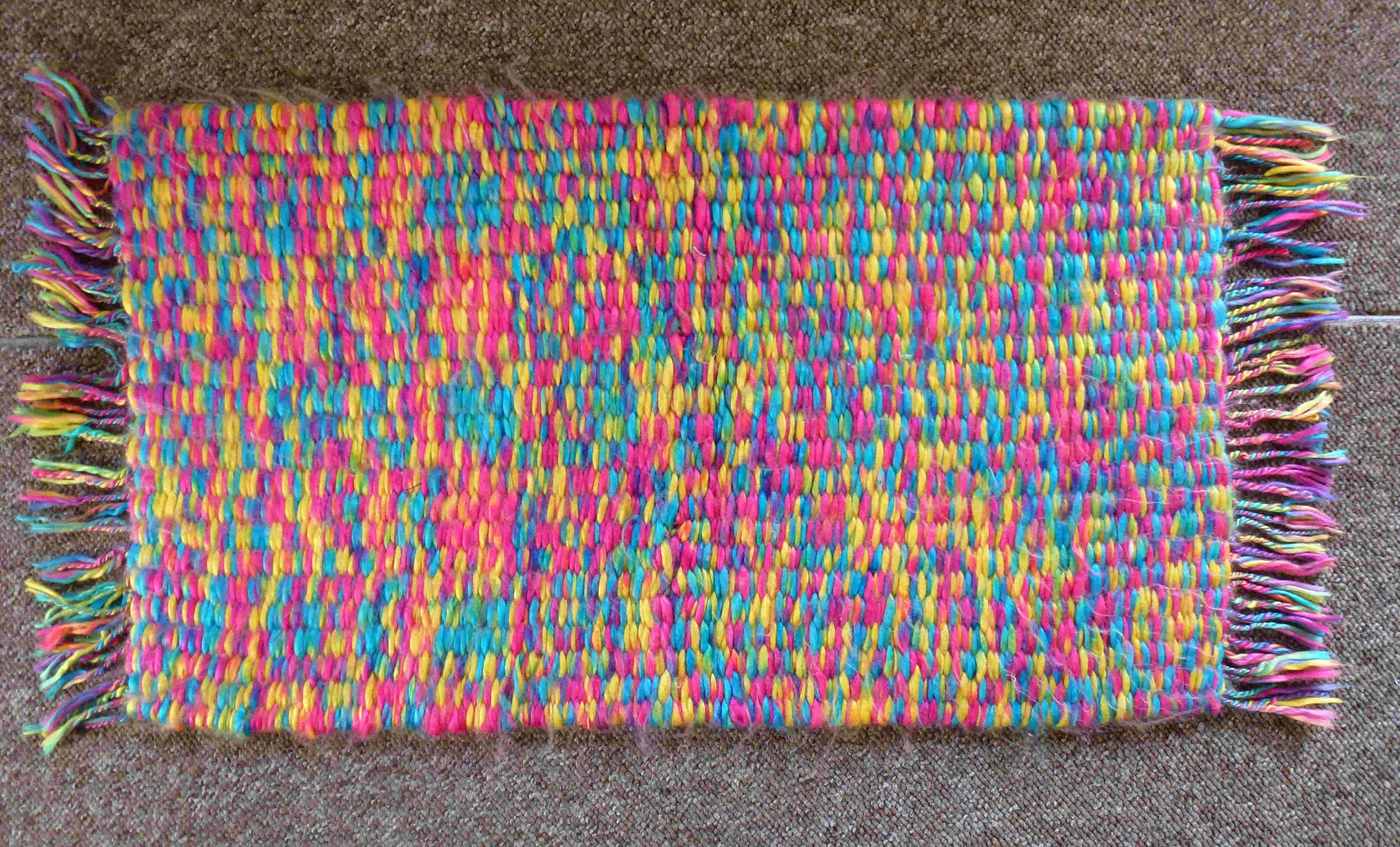 pegloom weaving of a rug